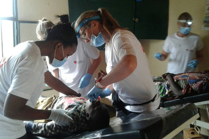 Dentists attend to people with dental problems in Gicumbi District. / Lydia Atieno