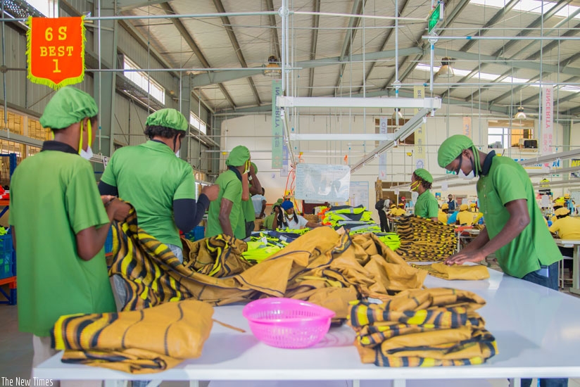 Workers at G&H Garment Rwanda make outfits. File.