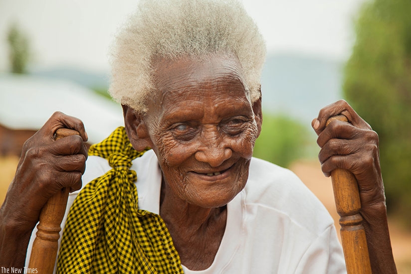 Nyiramandwa walks with support of two sticks. Here, she's was photographed at her home in the small village of Ndiryi in Gasaka Sector, Nyamagabe District last week. Photo/ Nadege Imbabazi.