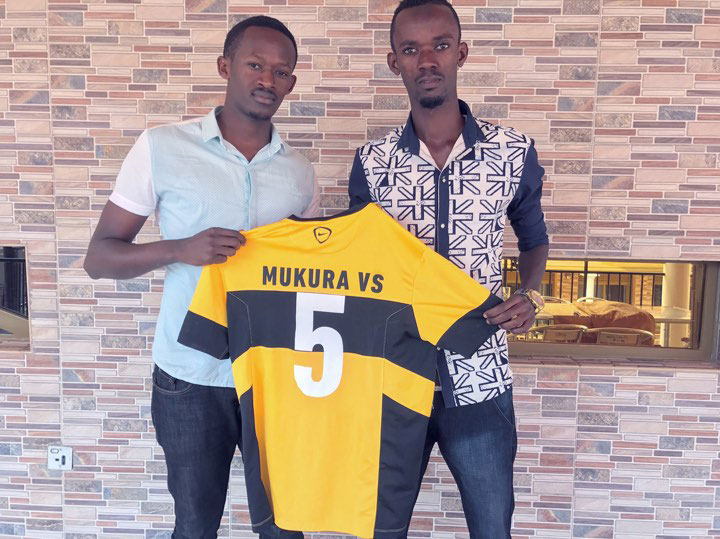 Iragire poses with Mukura secretary general Fidele Niyobuhungiro after signing a two-year deal. / Courtesy