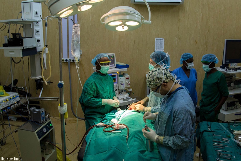 Medical practitioners carry out a specialised surgery at Rwanda Military Hospital. The meeting will provide a platform for young medics to share experience. File.