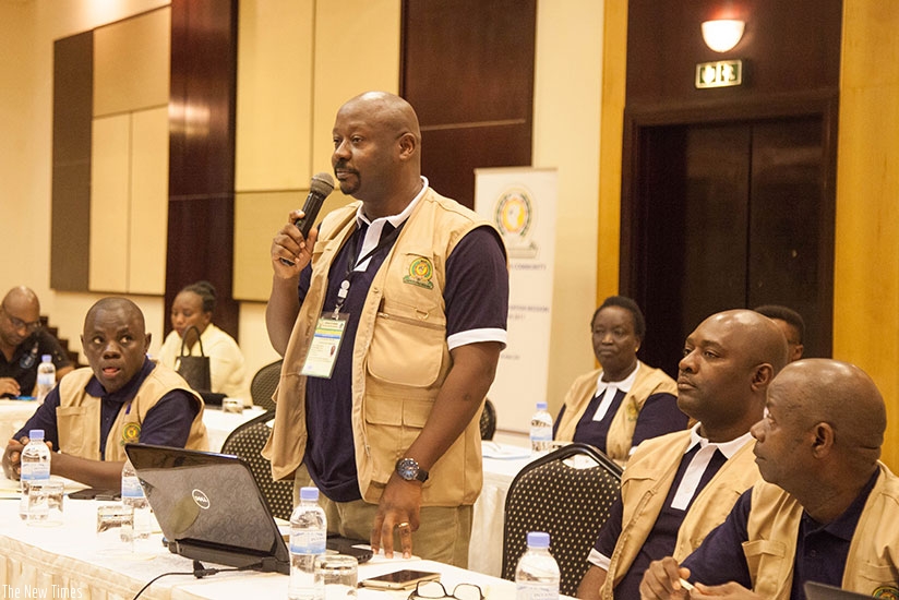 One of the observers gives a comment during the official launch of the EAC Observer Mission recently. Nadege K. Imbabazi