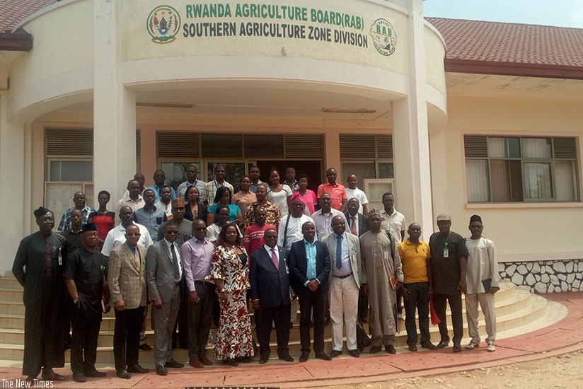 The Nigerian delegation and their Rwandan counterparts pose for a group photo at Rwanda Agricultural Research Institute at Rubona station, Huye District, on Tuesday. Remy Niyingize. 