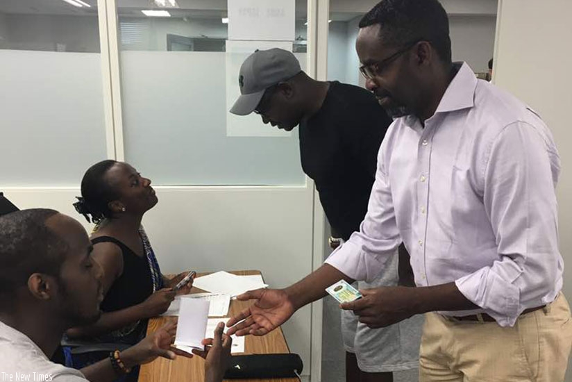 Rwandans living in Japan at a polling station in the City of Kobe yesterday. Courtesy.