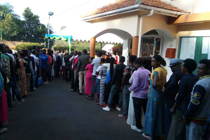 The lines snaked out of the gates of the Rwandan High Commission in Uganda as thousands turned up to vote. G Muramira