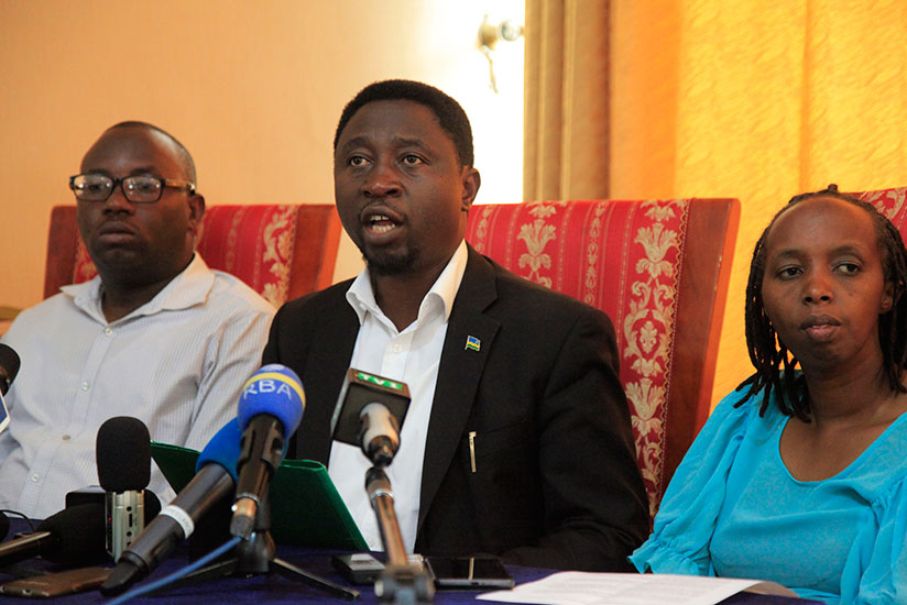 Green Party flag bearer Frank Habineza addresses journalists during yesterday's press conference. On the left is Green party Secretary General Jean Ntezimana while on the right is ....