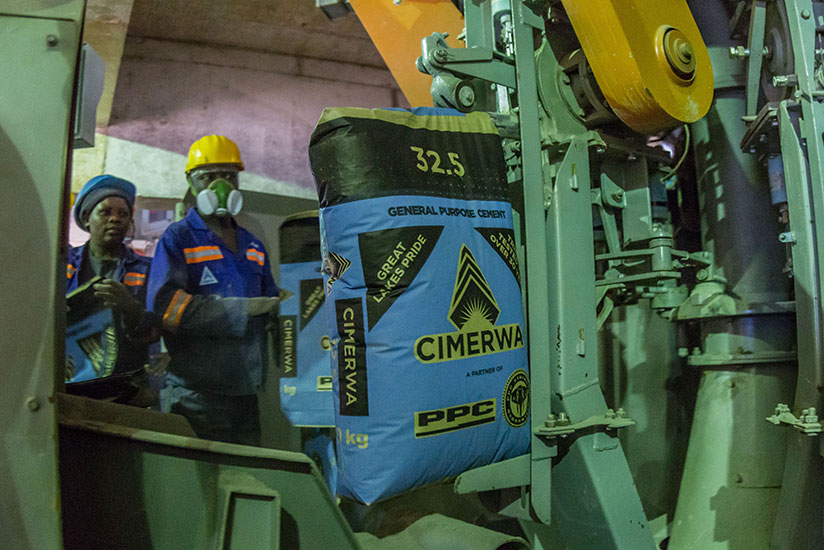 Cimerwa workers monitor a production line. Cimerwa is one of the firms that have strived to create brand visibility. /File. 