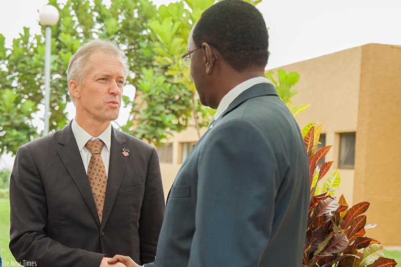 Amb. Pauwels bids farewell to Makuza in Kigali, yesterday. Nadege K. Imbabazi. 