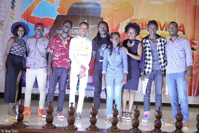 Future Records boss David Tuyishimire (in a black t-shirt), with some of the u2018I am the Futureu2019 contestants. Courtesy.