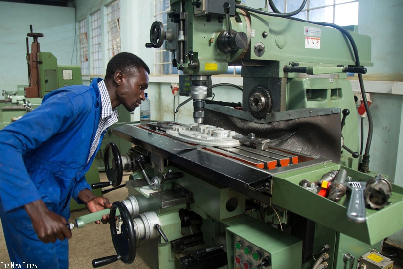 A student makes a logo during a practical lesson at IPRC-Kigali last year. File.