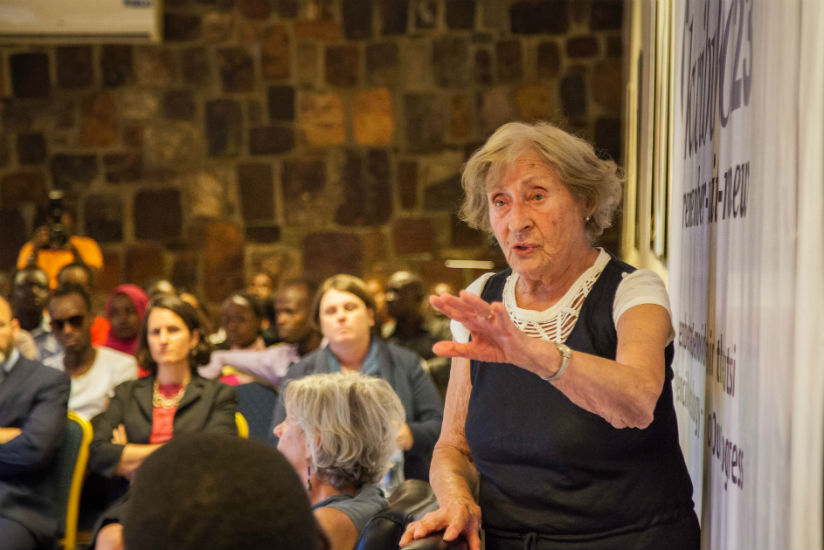 Holocaust survivor Susan Pollack shares her emotional testimony of how she survived Holocaust to 50 young genocide survivors from members of survivors associations in Rwanda. / Nad....