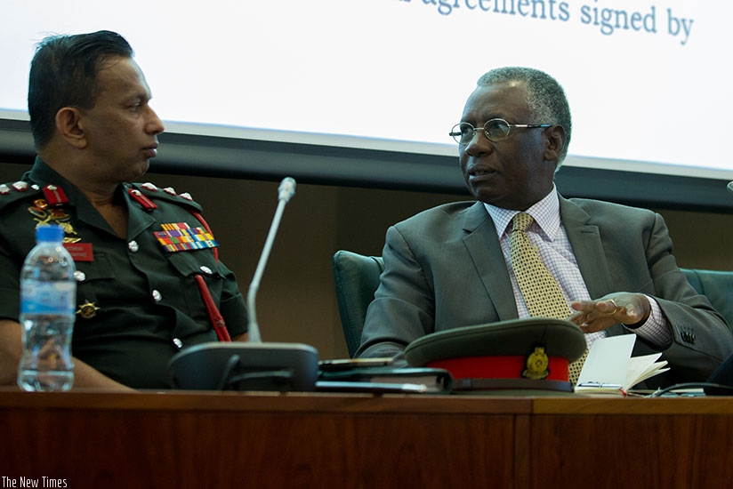 Senator Michael Rugema  and Col. Kirnlkitsli Akanayake, the head of the visiting Sri Lankan military delegation at the Parliamentary Building in Kimihurura, Kigali yesterday. T. Kisambira