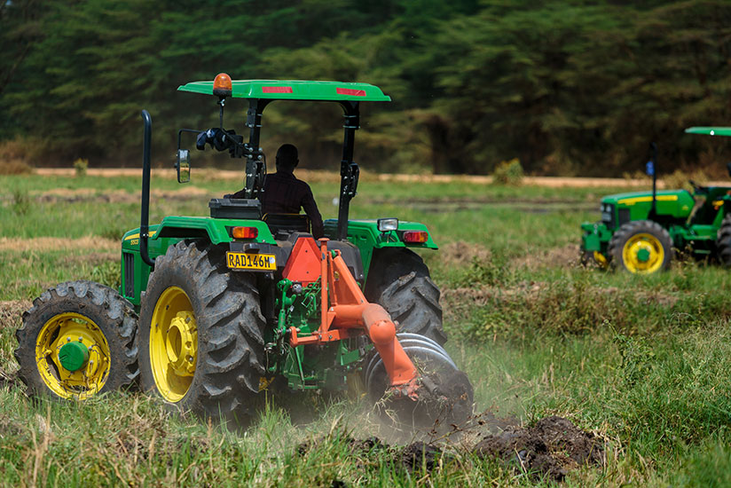 The new tractors plough in the 1,750 hectares of Muvumba marshland. / Timothy Kisambira