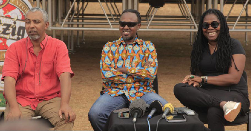 Mighty Popo (C)  at the news conference on Thursday morning. Right is Ivorian female Bassist Manou Gallo, and left is Albert Rudatsimburwa, the co-organiser of KigaliUp festival. S....