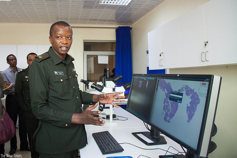 Dr Karinganire explains how the new machine operates. / Nadege Imbabazi