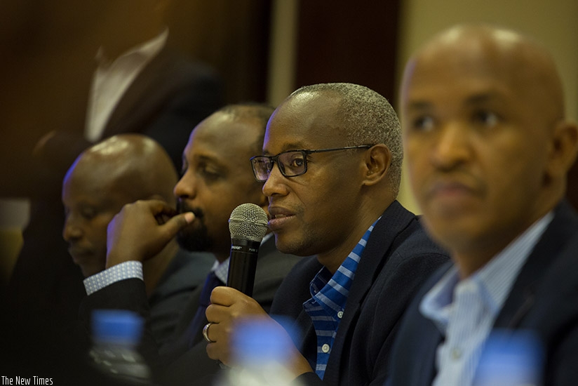 PSF's Ruzibiza speaks during the meeting in Kigali. Timothy Kisambira.