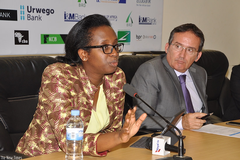 Rwanda Bankers Association Chairperson, Dr. Diane Karusisi, left, addressing the press on Tuesday afternoon. Damas Sikubwabo