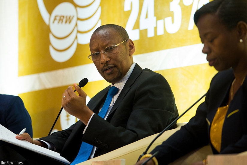 Rwangombwa presents the financial report in Kigali yesterday. Timothy Kisambira.