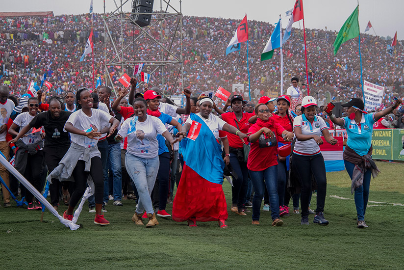 People chant and dance at RPF-Inkotanyiu2019s presidential candidate Paul Kagameu2019s campaign rally in Rubavu District last month. File.