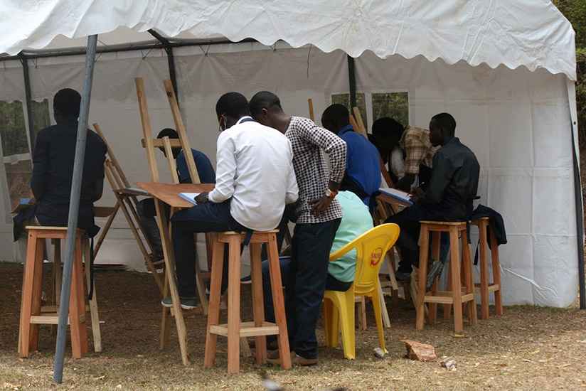 Students of the graphic arts going through practical lessons. / Courtesy