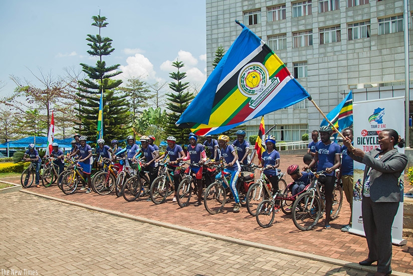 Seraphine Flavia, the Acting Director General of East African Community Affairs at the Ministry of Foreign Affairs and Cooperation, flags off the East African Community Bicycle Tou....