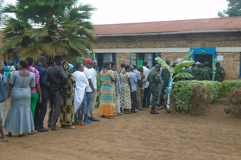 Voters qeue to exercise their civic right in Kigabiro sector, Rwamagana district during last month's presidential election. Steven Muvunyi. File.