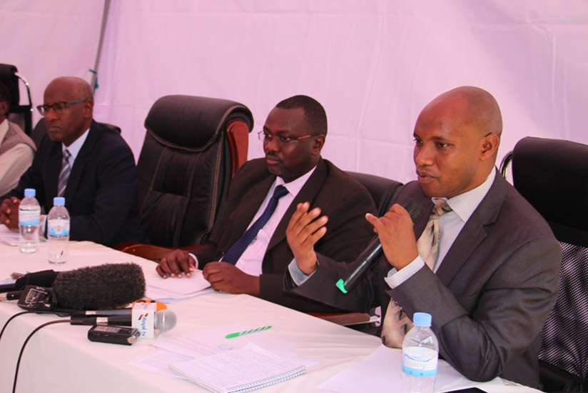Anthony Twahirwa, the Division Manager of Weather Services and Application Division at Rwanda Meteorology Agency speaking, as Jean Baptiste Nsengiyumva(Middl, Midimar and John  Ntg....