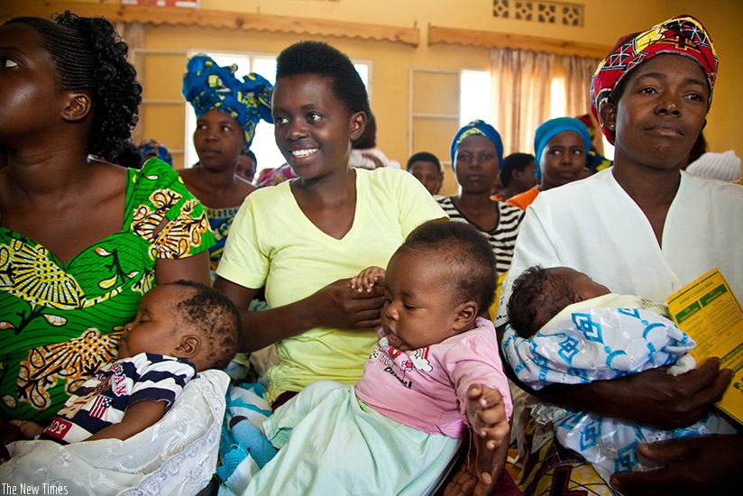 Mothers wait for service at Busanza Health centre in Kanombe. Timothy Kisambira. 