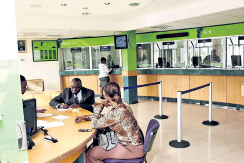 Customers  line up for credit at KCB bank branch in Nyarutarama. File
