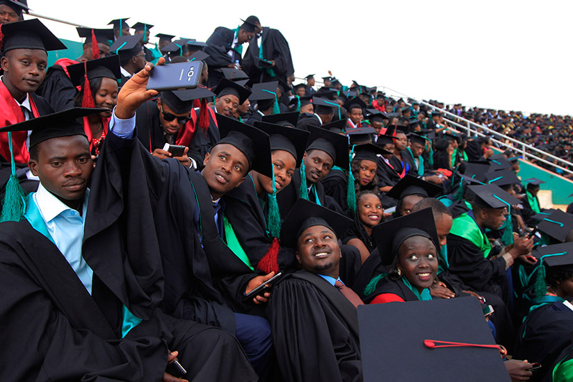 A cross-section of UR graduates share a light moment on their graduation day last month. / Sam Ngendahimana