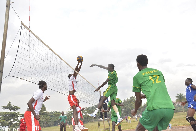 Kirehe Volleyball Club (in green) against REG during the regular season. They host Gisagara in Game 2 of the playoff finals today. / File