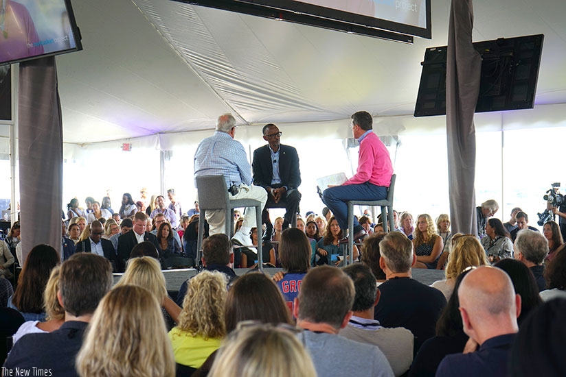 President Kagame flanked by Bob Diamond-  CEO of Atlas Merchant Capital (R) and Jim Sinegal, Founder and former CEO of Costco, during the Nantucket Project forum in Massachusetts, ....
