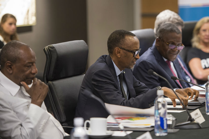 President Kagame addresses the 5th SDG Center for Africa Board Meeting as President Alpha Conde of Guinea (left) and Nigerian business magnet Aliko Dangote, the initiative co-chair....