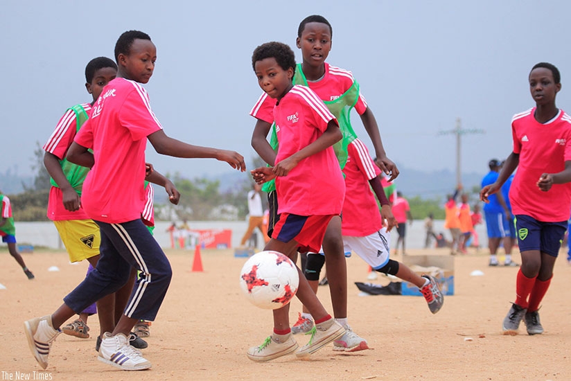 Young girls learn how to play football under Live your Goals program in Ruhango District. / Sam Ngendahimana