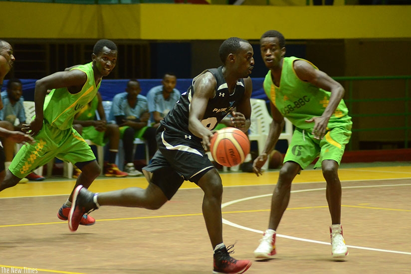 Aristide Mugabe (with the ball) during a regular season league game against UGB, will lead Patriots in their search for a first regional title. (Sam Ngendahimana)