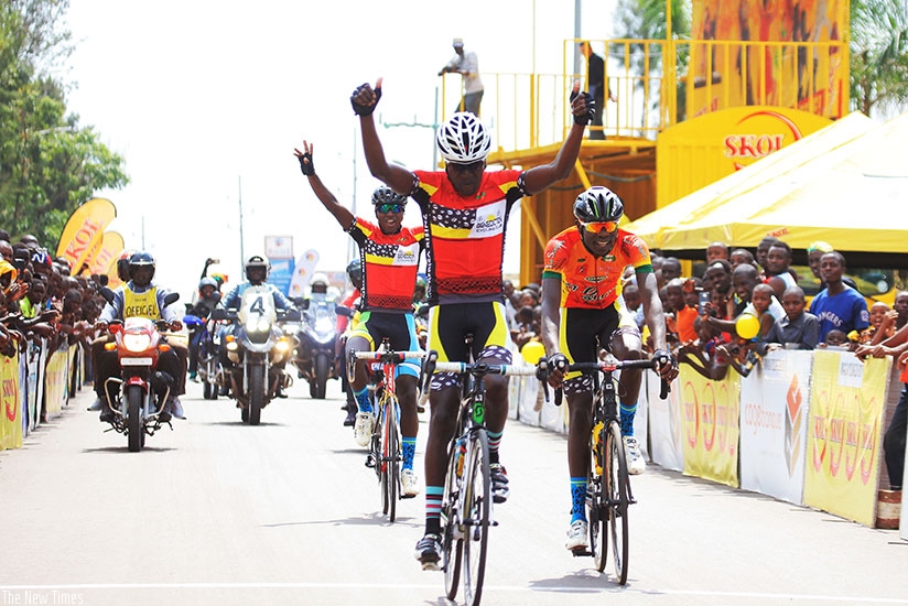 Byukusenge celebrates as he crosses the finish line en-route the Muhazi Challenge  ahead of  teammates Nsengimana and  Munyaneza in Rwamagana on Saturday. Sam Ngendahimana