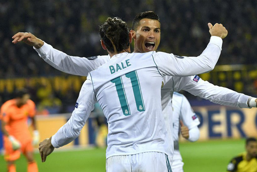 Cristiano Ronaldo (right) celebrates with Gareth Bale after the pair linked up to to score Madrid's second goal of the game. / Internet photo