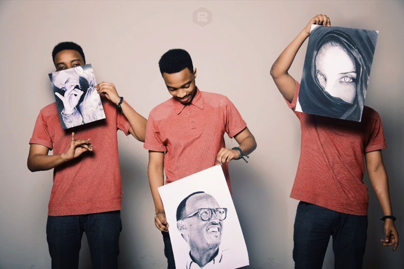 Khaled Cyuzuzo with some of his portraits.