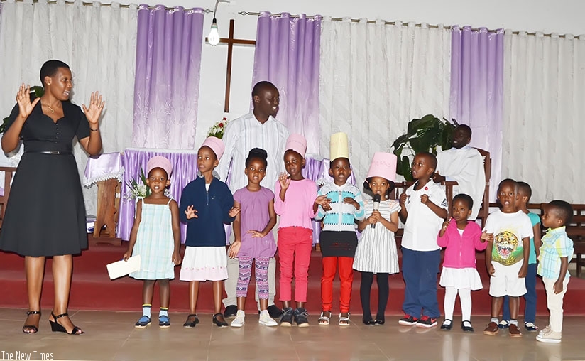 Children singing during Sunday school service. In Sunday schools children learn the value of helping one another.  (Dennis Agaba)