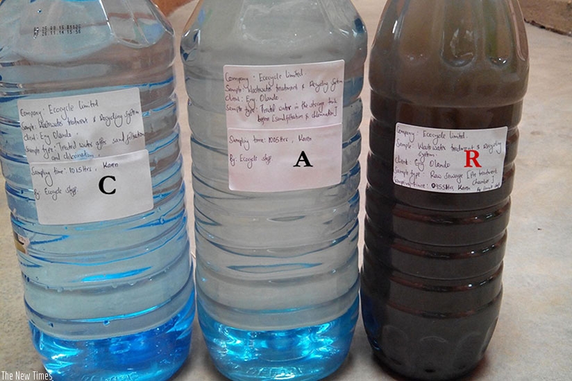 Treatment levels at Ecocycle. The bottle on the right shows raw sewage:  the one in the centre shows water in SRB (Sequential Batch Reactor) after treatment, while the one on the l....