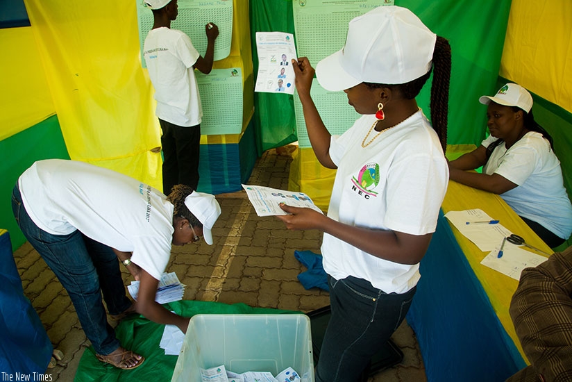 Electoral agents count votes in Remera, Gasabo District during the recent presidential elections. (File)