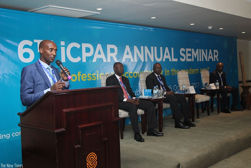 RRA commissioner General Richard Tusabe addresses accountants during their annual seminar in Rubavu. (Courtesy)