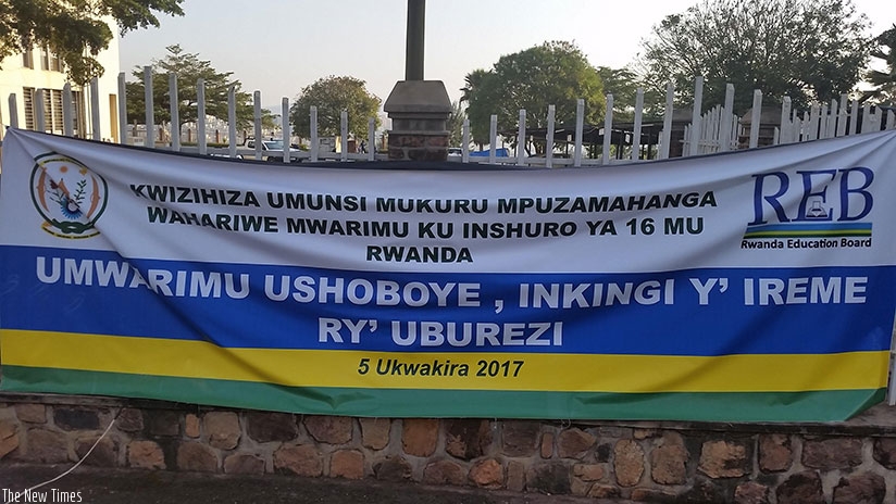 A banner that proclaims today's World Teachers' Day on display in Remera, Kigali. Umwalimu-SACCO says it has stepped up efforts to recover bad loans. (Courtesy)