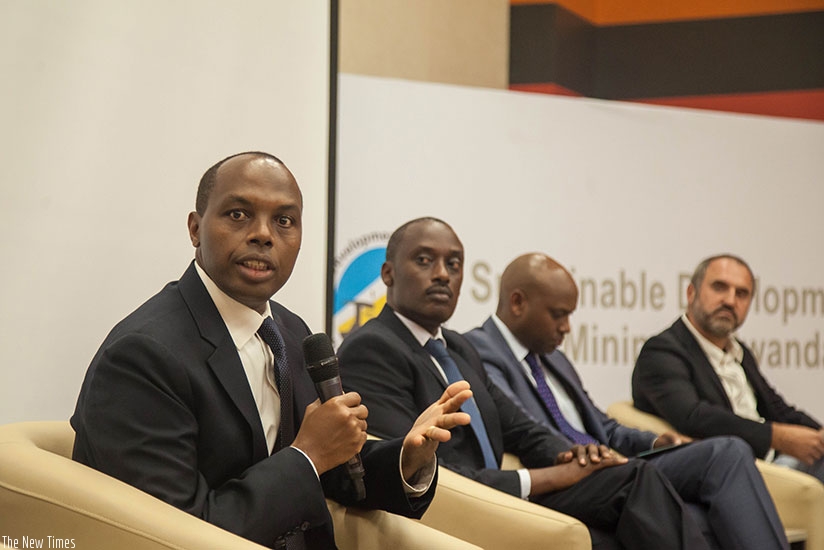 The Chief Executive of Rwanda Mines, Petroleum and Gas Board, Francis Gatare, speaks during the launch of sustainable development of mining in Rwanda as Frank Butera, the executive....