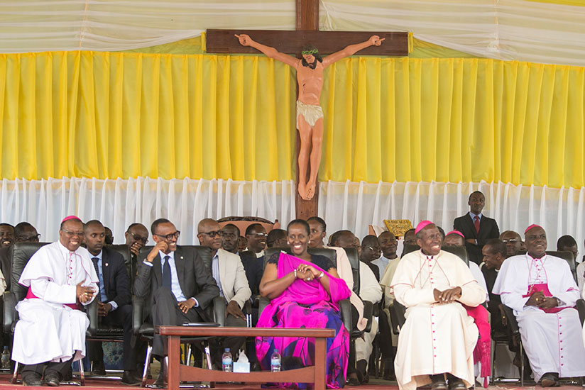 President Kagame and First Lady Jeannette Kagame with Bishop Philipe Rukamba of Butare Diocese (L) and Bishop Smaragde Mbonyintege of Kabgayi Diocese (R) during the centenary anniv....