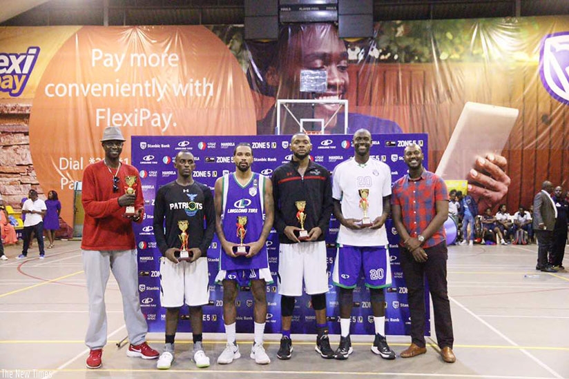 Patriots' Mugabe (2nd left) and Kabange (C) were named on the team of the tournament along with Mayes (Oilers), Stanley Ocitti (Oilers) and Betway Power's Mike Makiadi. Courtesy