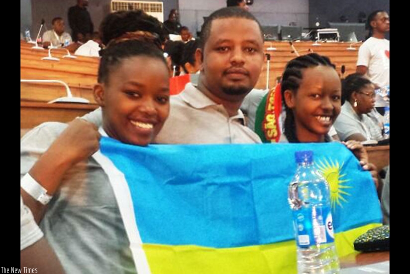 Yvette Ishimwe (right), of Iriba Clean Water Delivery, and other two enterprising Rwandan youth attended last year's forum. (File)