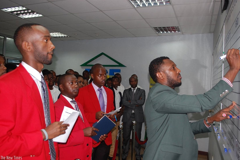 RSE dealers and officials during a trading session in March. 