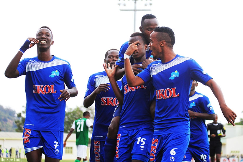Rayon sports players celebrate the opening goal scored by Faustin Usengimana during the league match against Kiyovu at Kigali Stadium on Sunday. Sam Ngendahimana
