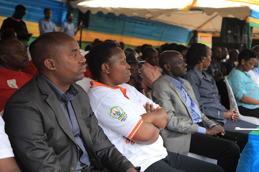 Eliane Ndererimana, the Senior Program Manager of The Fred Hollows Foundation (2nd L) and officials following the proceedings of the event at Masaka Hospital.